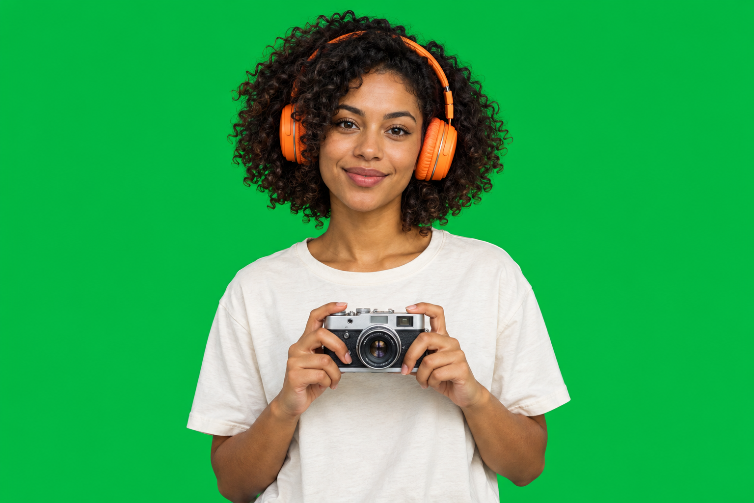 Content creator on a green screen before chroma key removal
